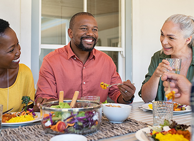 group of people eating at a table